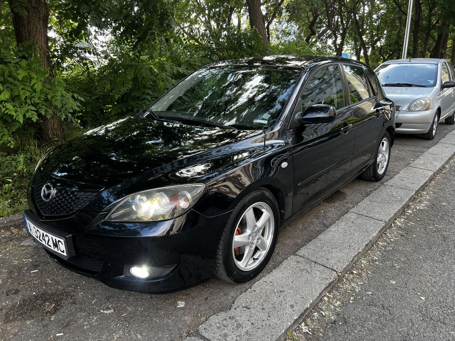 Mazda 3 1.6d 109кс