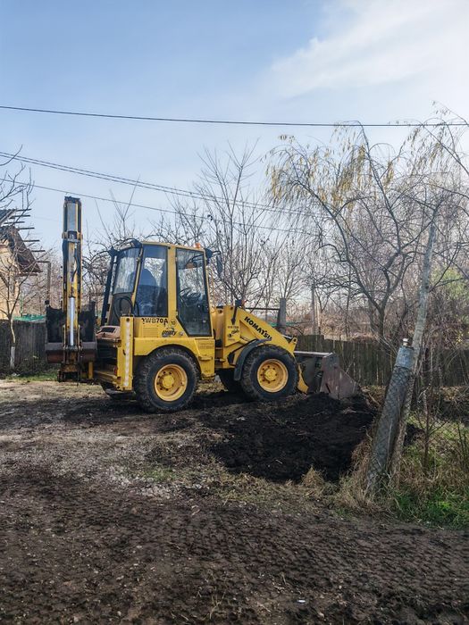 Buldoexcavator Komatsu wb70a
