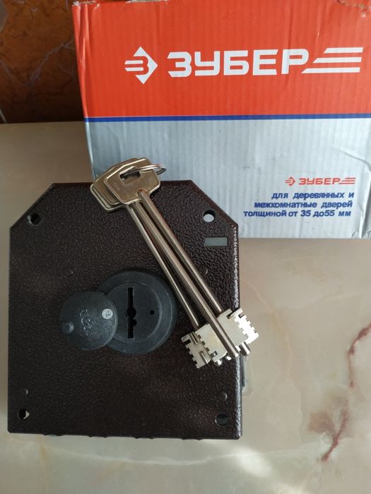 Замок накладной, новый.