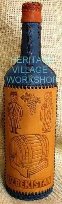 Бутылки сувенирные декорированные кожей.