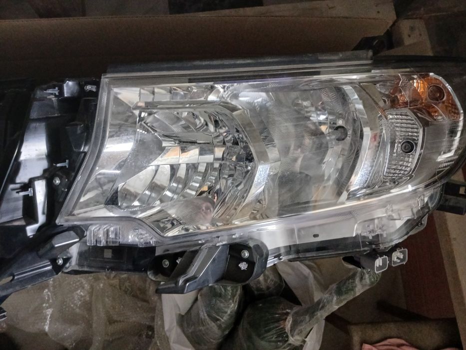 Фары, решетка, магнитола Prado