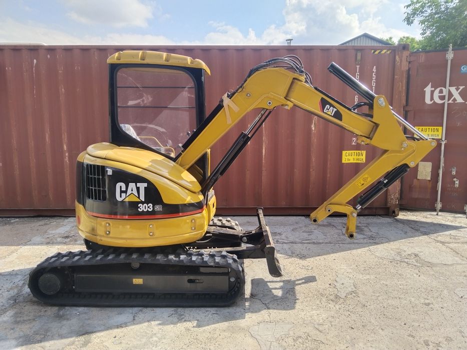 Миниэкскаватор Caterpillar