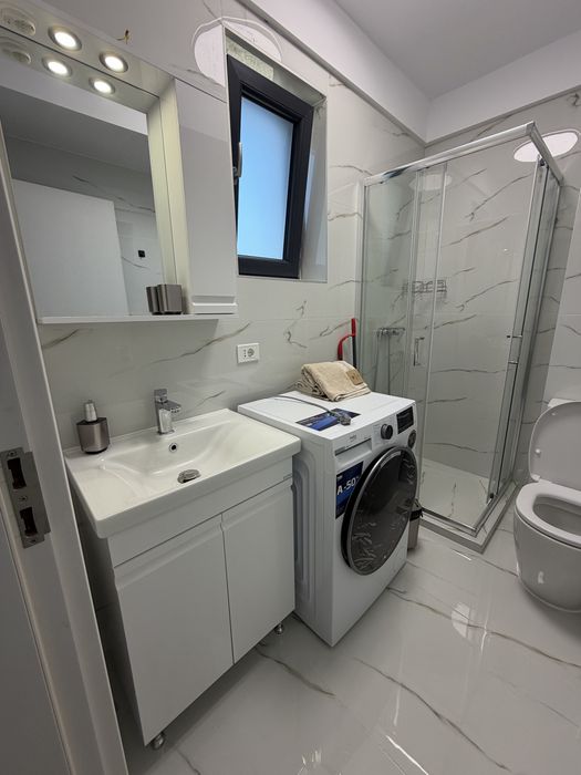 Proprietar inchiriez apartament 2 camere loc de parcare central Otopeni