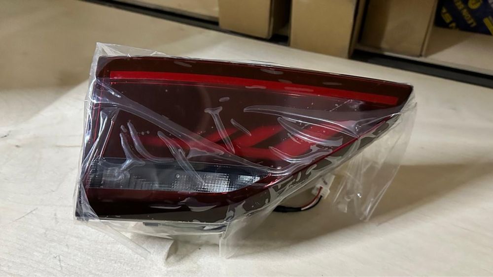 Geely Emgrand  фары оптика