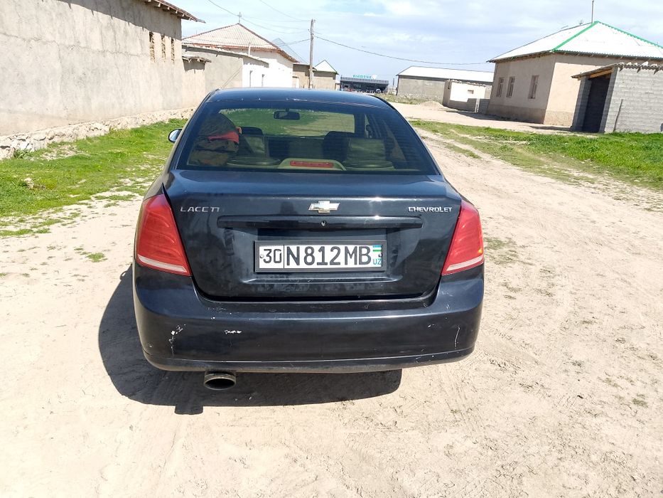 Chevrolet Lacetti / Gentra 2010 — 2