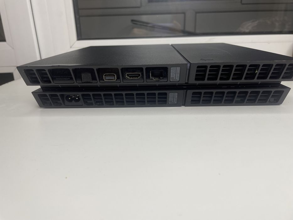 PlayStation 4 Slim 500GB + 9 топовых игр