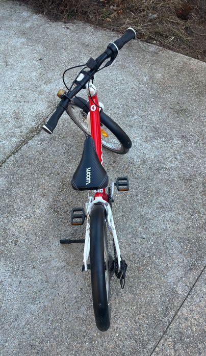 bicicletă Woom 4, roșie, apărători, lumini, sonerie