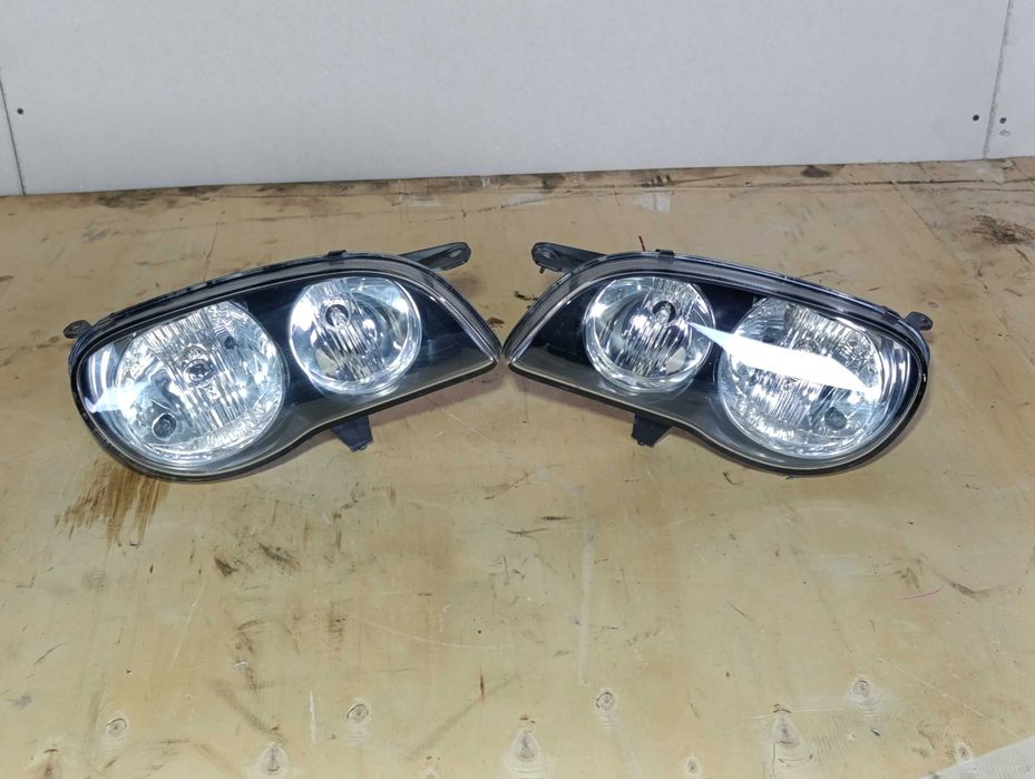 Фары передние Toyota Corolla E110 рест 99-01г