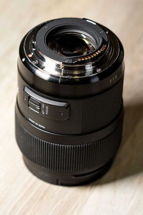 Обектив Sigma 35mm f1.4 DG Art за Canon EF + докинг станция UD-01