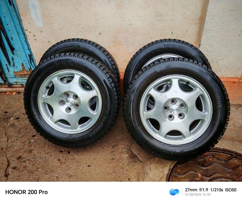 Продам зимнюю резину с дискам на Субару