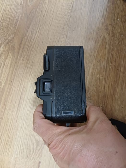 Aparat foto Pentax P30 functional. Buza obiectivului putin deformata