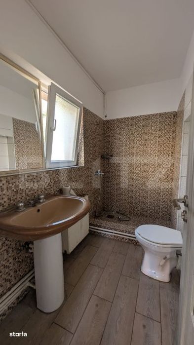 Casa cu 2 camere si mansarda ,plus bucatarie de vara .