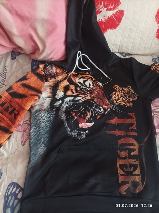 Продам  костюм новый