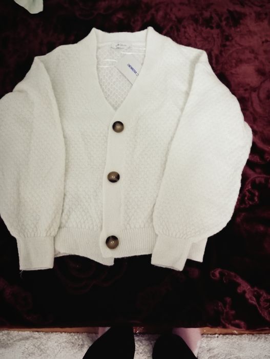 Jemfercha kardigancha jaketcha gʻalat burukcha