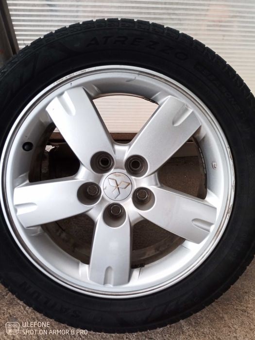 Джанти с гуми и гайки за Мицубиши аутлендур 17 цола