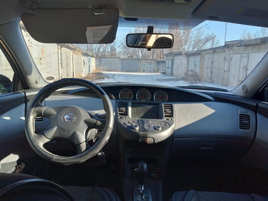 Ниссан п12 2002 год