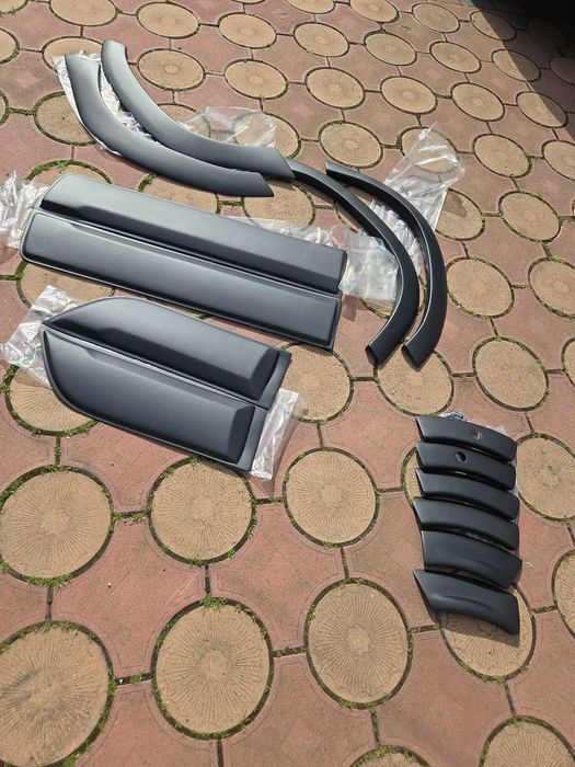 Set 14 Bandouri Laterale Protectii Bara Aripa USI Overfendere DACIA DUSTER 2 2018+