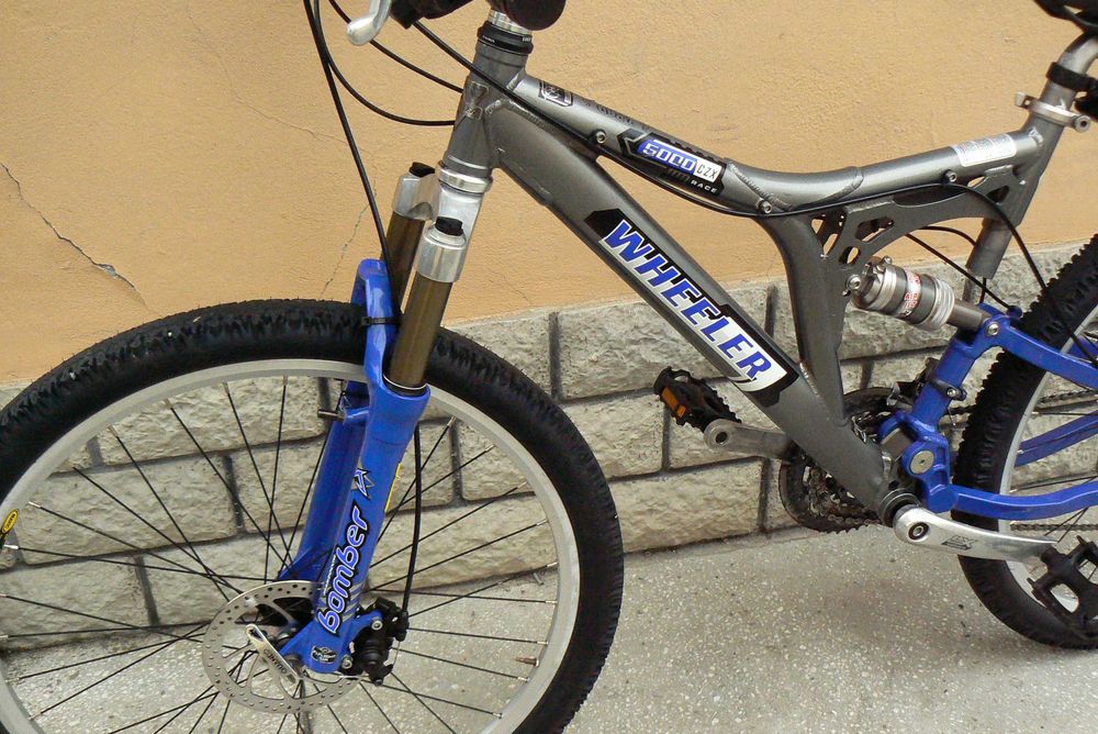 Bicicleta mountain bike de copii full suspensie Wheeler 26