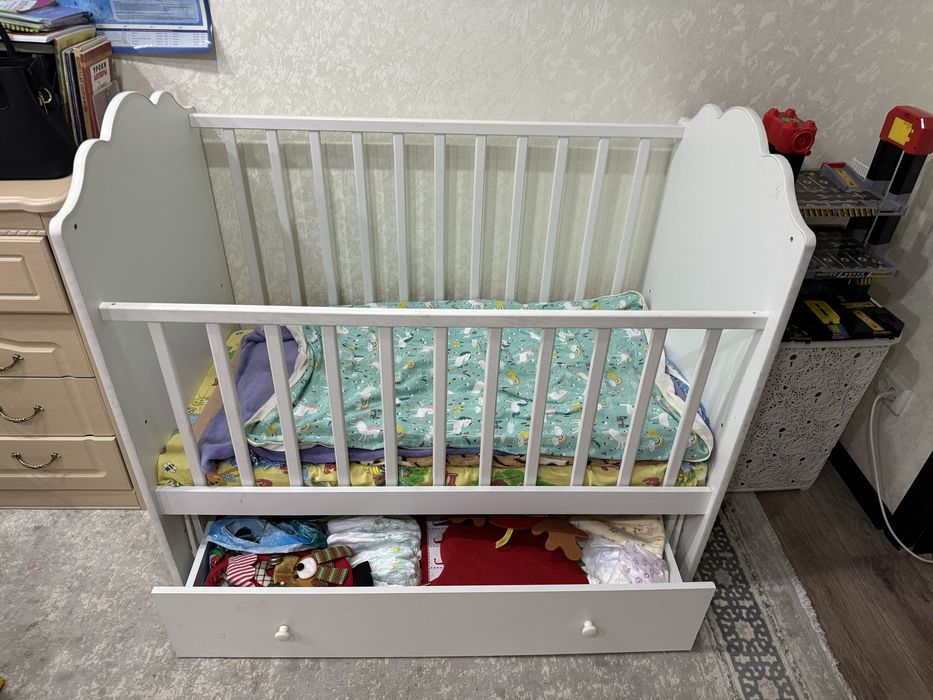 Детская кроватка маятник