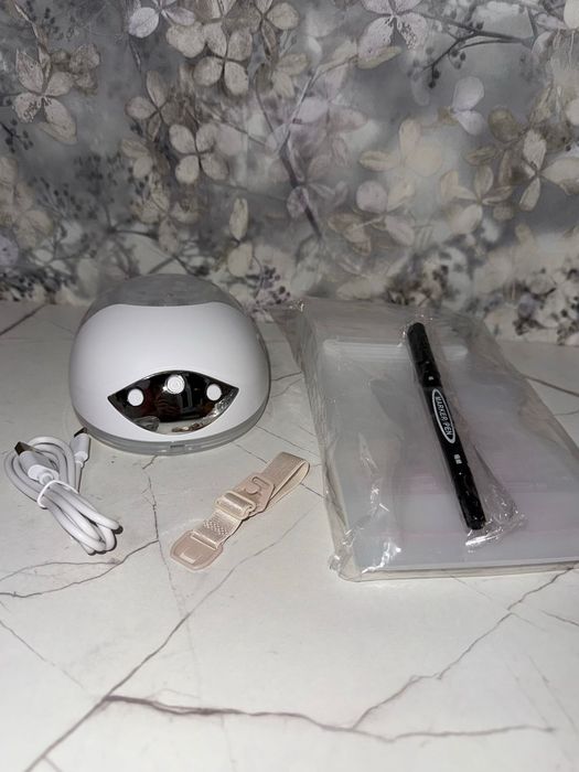 Молокоотсос электрический