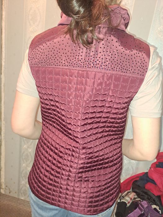 Продам жилет новый