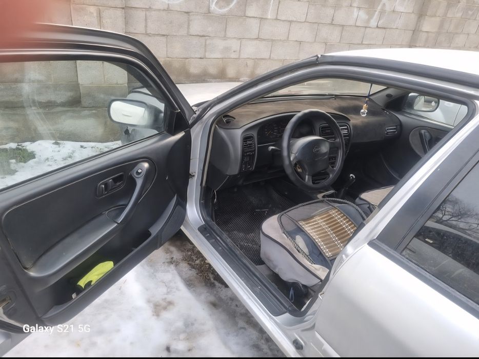 Nissan P10 , 1.6, 1997