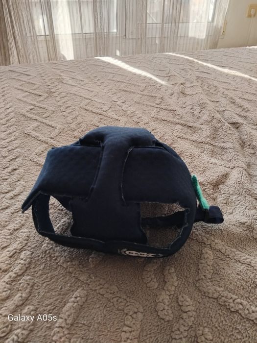 Бебешка каска за прохождане