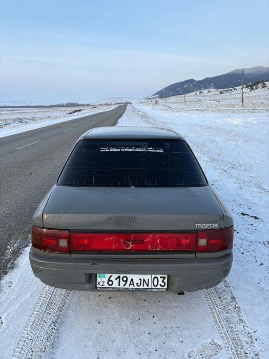 Мазда 323BG 1990