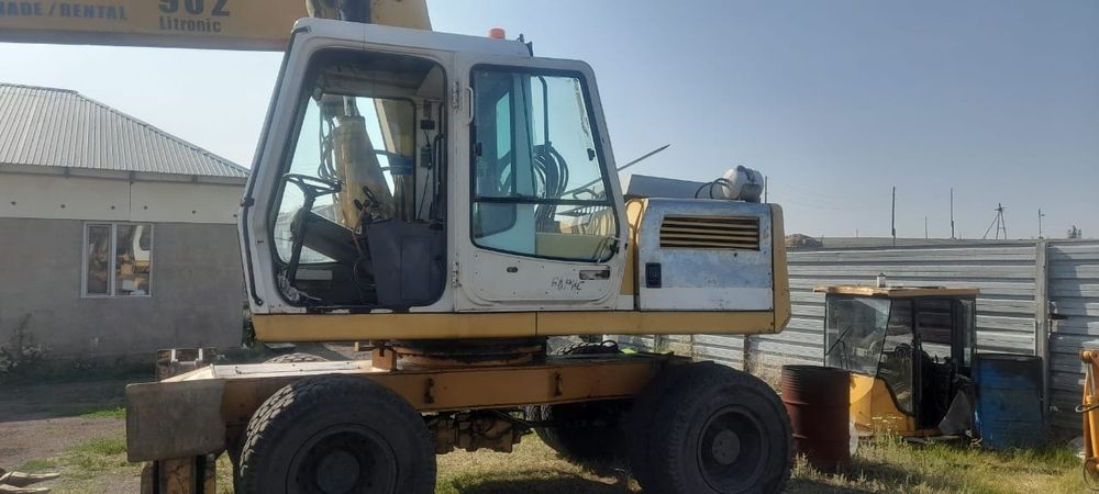 Экскаватор колесный