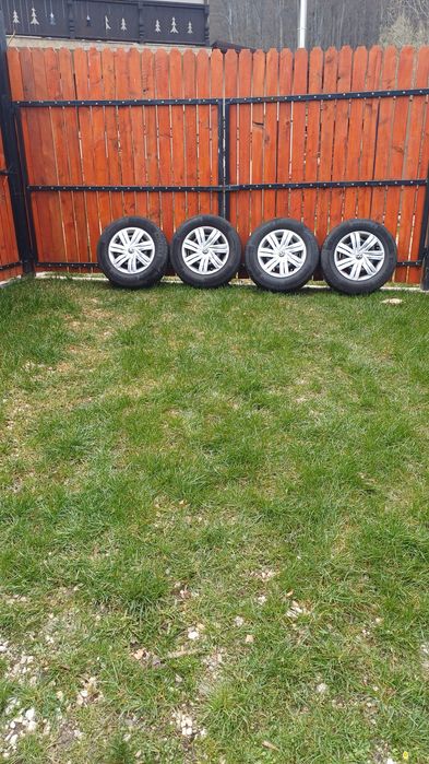 Anvelope vara continental 185 70 14 H  cu jante si capace vw polo,sko