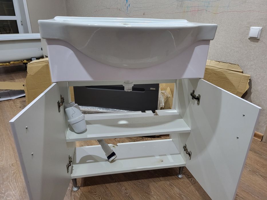 Продам раковину с тумбой