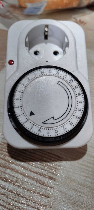 Часовник таймер 220в