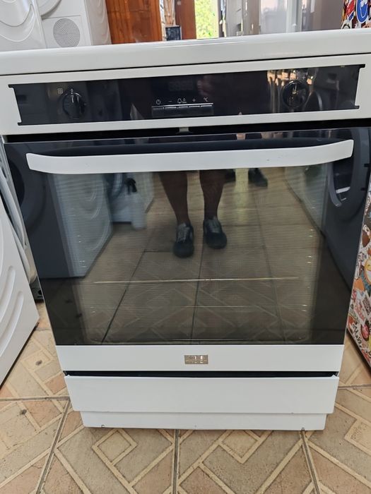 Свободно стояща печка с индукционни котлони Voss Electrolux с Pirolise и 2 години Гаранция!