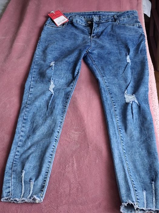 Джинсы новые,размер 50-52