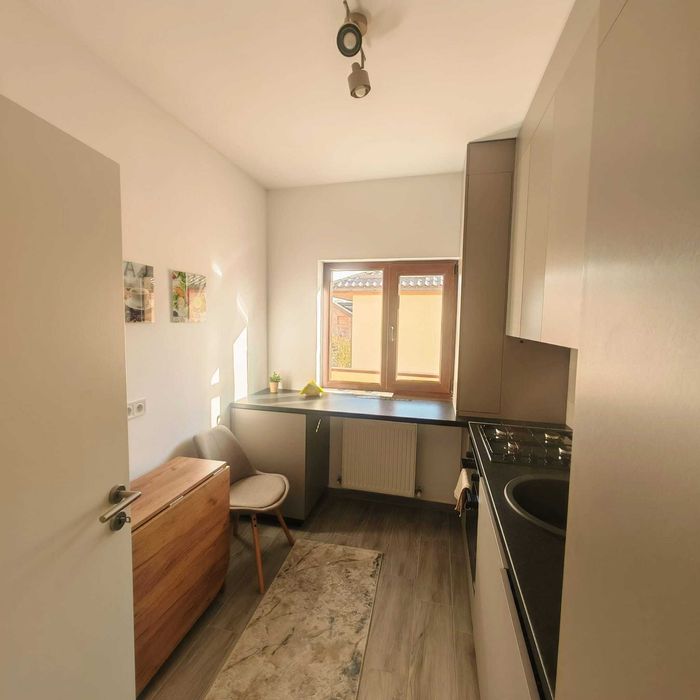 Garsonieră Modernă de Închiriat – Sânpetru (Brașov) + Loc de Parcare