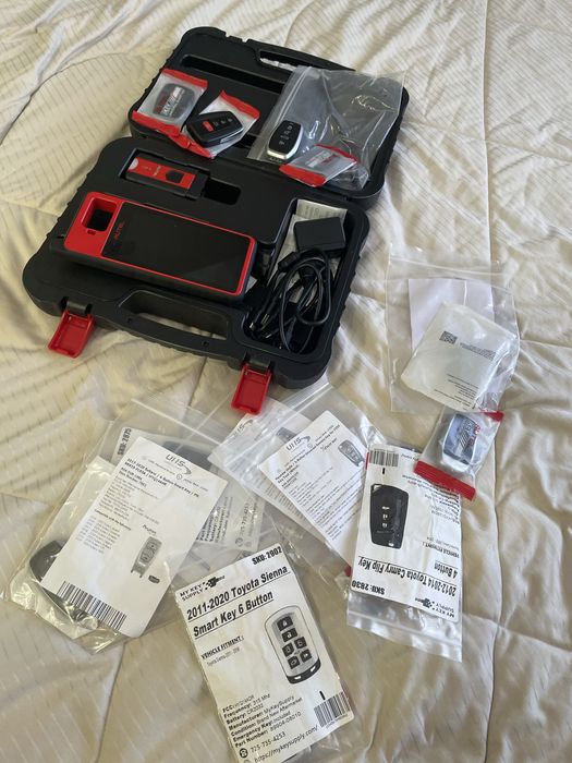 Программатор ключей Autel KM100