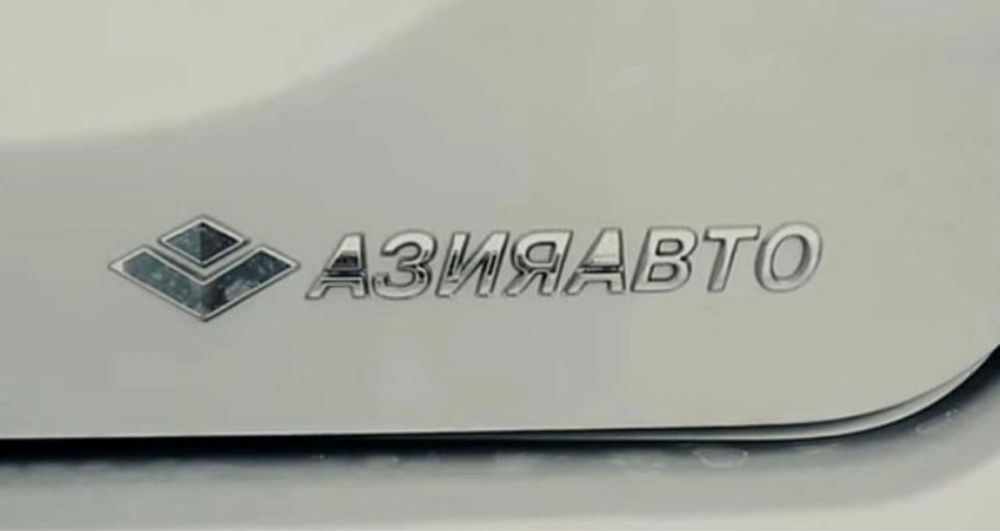 Шильдик , значок Азия Авто