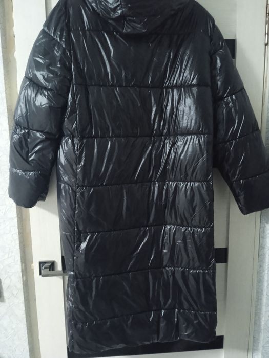 новый пуховик продам