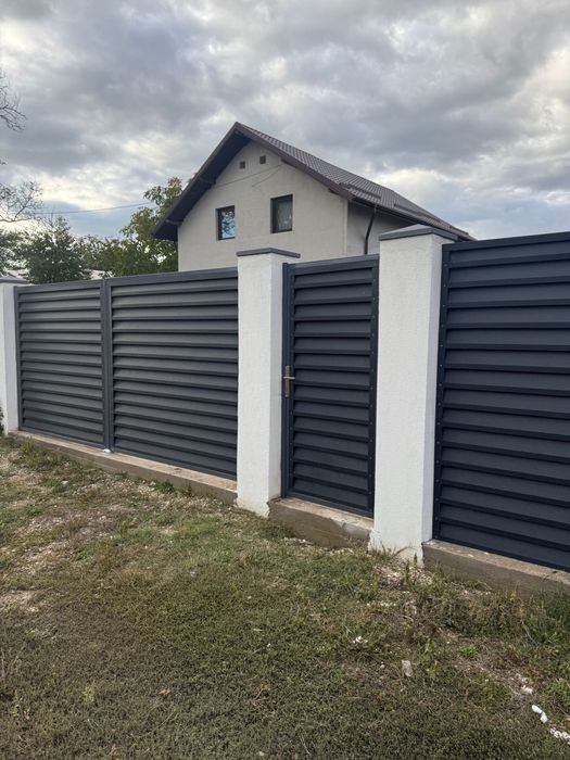 Confectii metalice,Panouri Gard,Porti balamale si  Role,Usi Garaj,balustrade balcon,maini curente scara