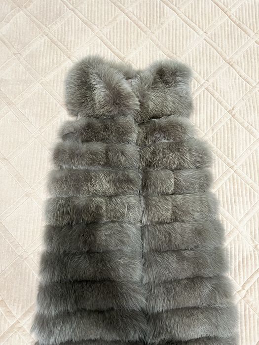Продам меховую жилетку