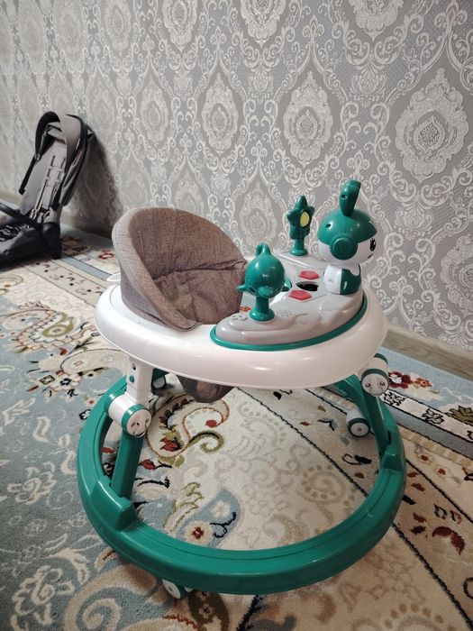 Коляска мен ходунок сатылады