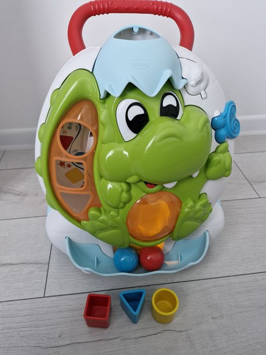 Jucarie Chicco 2 in 1, centru de activitati si antemergator Dinozaur, 9-24 luni