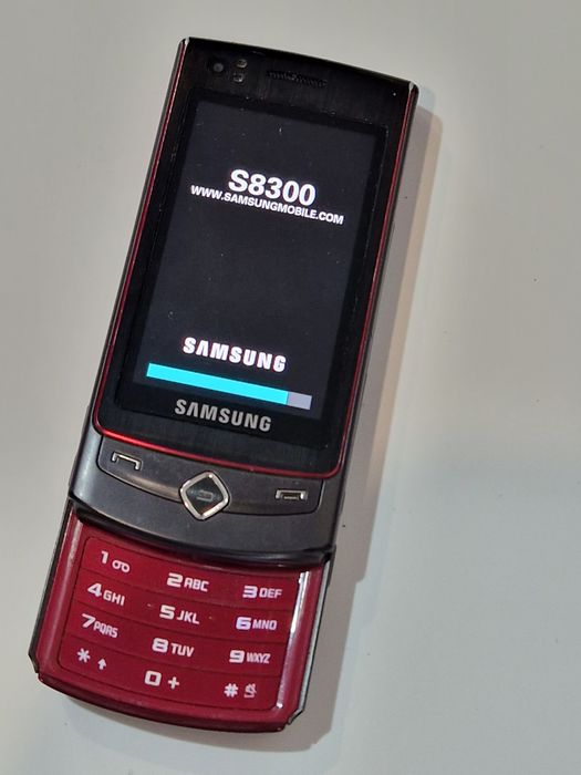 Super telefon Samsung - S8300 cu încărcător original