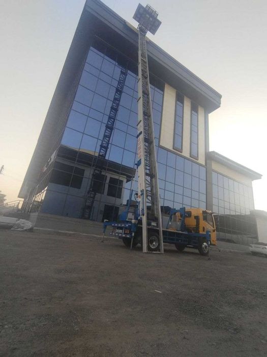 AVTOLIFT 32 metr yuklarni yuqori qavatlarga chiqarish (MOBILNIY LIFT)