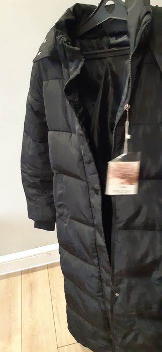 Продам пуховик тёплый.