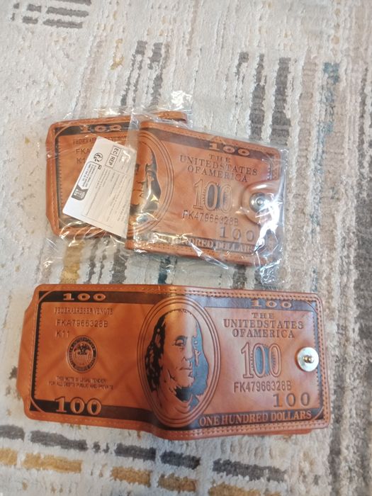 Продам Новое  партмоне с рисункок 100$