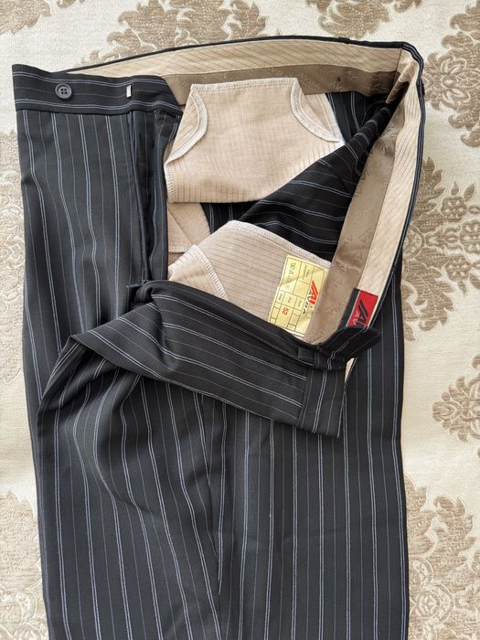 Мужской новый костюм