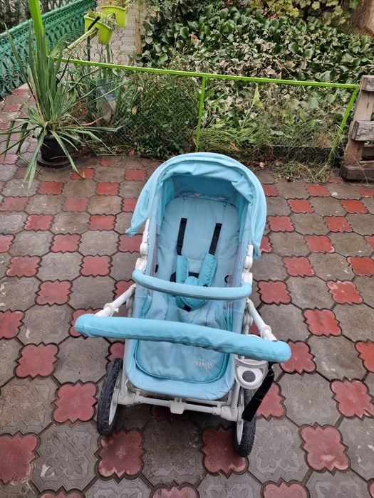 Продам коляску mige