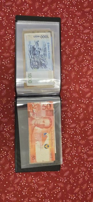 Vand album cu 20 bancnote.