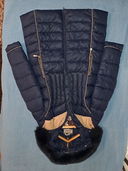 Продам женский пуховик б/у